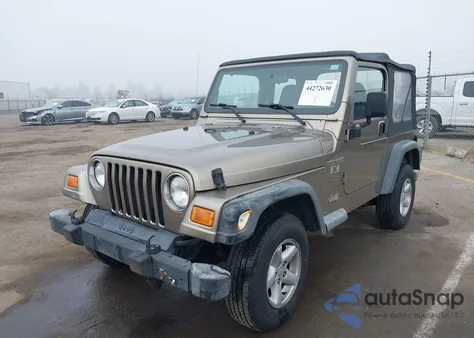 2002 Jeep Wrangler X z USA, uszkodzony, nr VIN 1J4FA39S02P774699